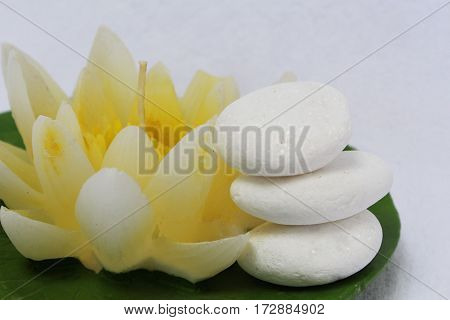 spa stil llife with lily candle,zen stone on the white background