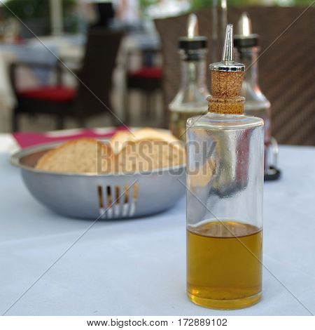 olive oil in a bottle with bread