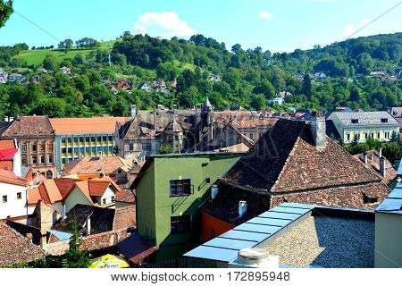 Urban landscape in the downtown of the medieval city Sighisoara, Transylvania, Romania.