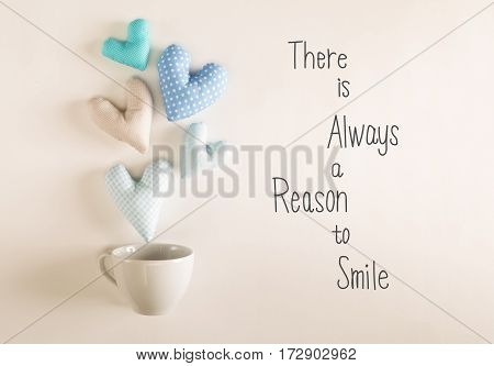 There Is Always A Reason To Smile Message With Blue Heart Cushions