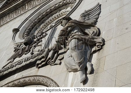 Horizontal image of Angel on the frontage Sao Torcato Church in Guimarães, Portugal.