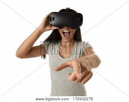 young attractive happy woman excited using 3d goggles watching 360 virtual reality vision enjoying cyber fun experience in vr simulation reality and new gaming technology isolated white background