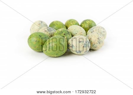 Quail eggs isolated on white background studio shot front view