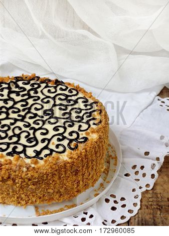 Homemade Cake With Nut Meringue Butter Cream And Decorated With Swirls Of Dark Chocolate. Kyiv Cake
