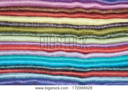 Background from the pile of Indian cashmere stoles