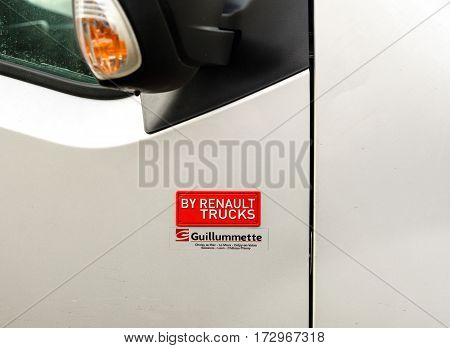 STRASBOURG FRANCE - FEB 2 2016: Red sign on the car - By Renault Trucks. Renault Trucks is a division of Renault building and assembling Trucks