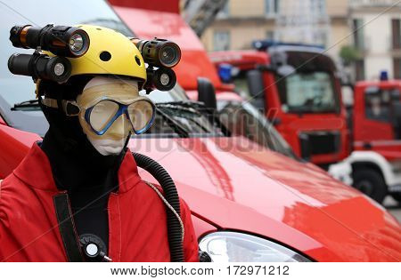 professional equipment for lighting during emergencies and caving expeditions with a dummy is a yellow protective helmet
