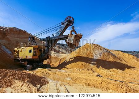 Sand quarry near the town of Orikhiv in Zaporizhzhia region of Ukraine. Excavator electric power shovel with bucket capacity of five cubic meters. September 2006