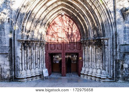 LISBON PORTUGAL - JANUARY 19 2017: Main portal of the Convent of Our Lady of Mount Carmel (Portuguese: Convento da Ordem do Carmo) in Lisbon Portugal.