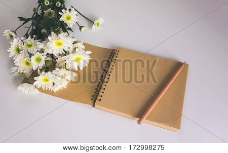 Blank Area Note Book Or Diary With Flower