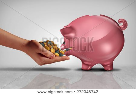 Concept Of Savings As A Hand Feeding Money Or Coins To A Hungry Piggybank Or Piggy Bank With 3d Illu
