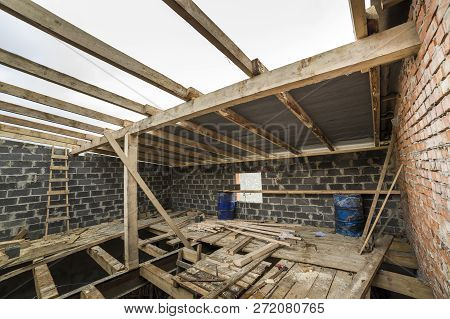 Two-storied Building Under Construction And Renovation. Perspective View Of Energy Saving Walls Of L