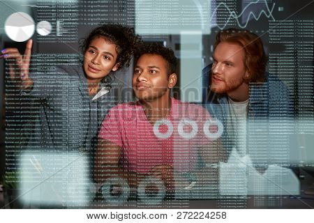 Young Team Of Data Analysts Are Going Through Endless Data Streams