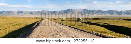 Unpaved Road And Yurts Near Son-kul Lake And Tien Shan Mountains In Kyrgyzstan