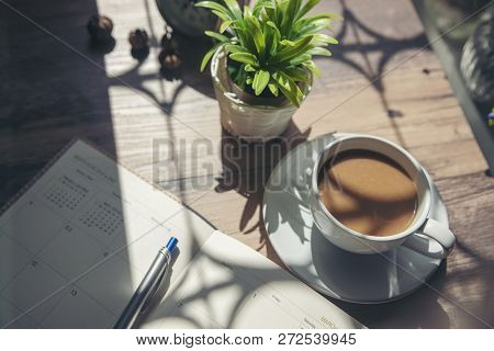 Desktop Calendar 2019 And Cup Of Coffee Place On Wooden Office Desk.calender And Diary For Planner T