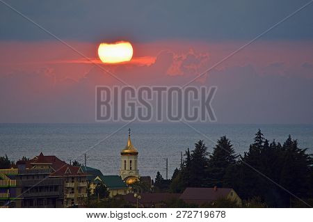 Sunset Over A Small Southern City On The Black Sea Coast. The Village Of Golovinka (lazarevsky Distr