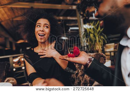 African Handsome Man Proposing To Girlfriend. Romantic Couple In Love Dating. Cutel Man And Girl In 