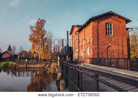 Old Hydroelectric Dam And Its Building In Forssa Finland At Sunset On An Autumn Evening