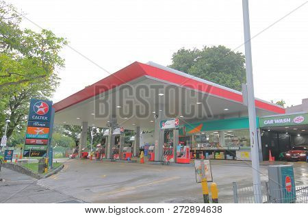 Singapore - November 19, 2018: Unidentified People Visit Caltex Petrol Station In Singapore.