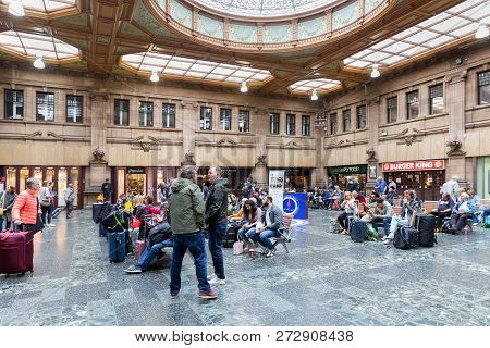 Edinburgh, Scotland - May 20, 2018: Waiting Room Waverley Station With Travellers Sitting And Waitin