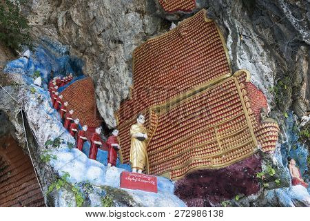 Hpa-an, Myanmar - 19 November, 2018: Horizontal Picture Of Aligned Monks Statues At Kaw Ka Thaung Ca