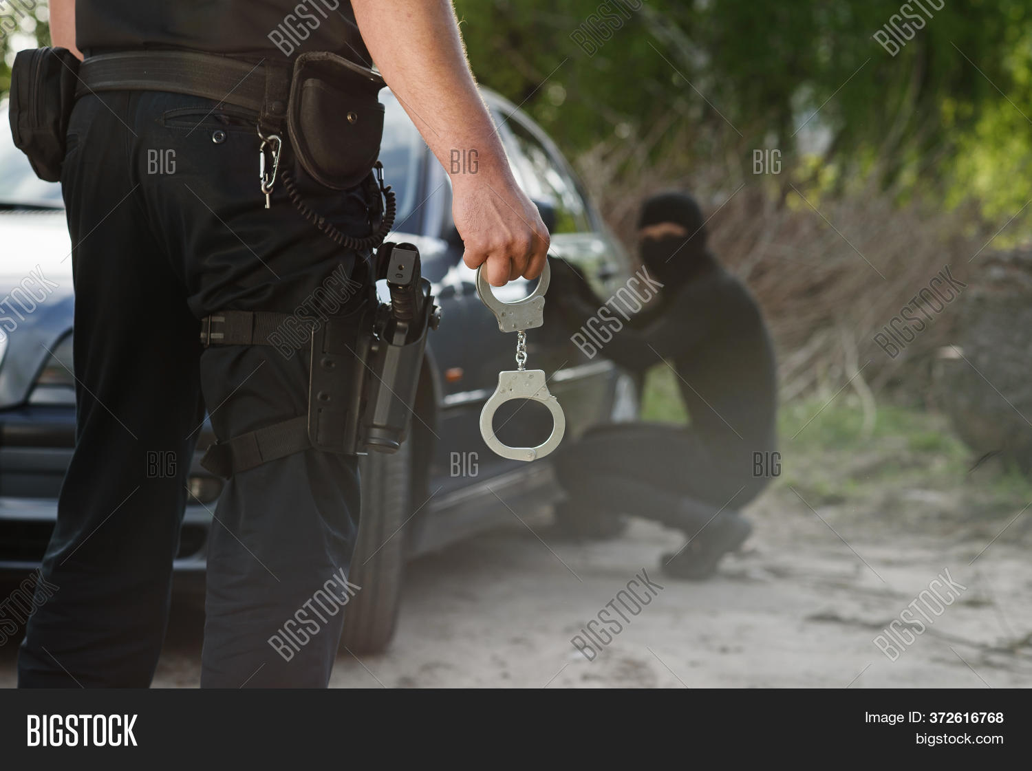 Police Officer Holding Image & Photo (Free Trial) Bigstock