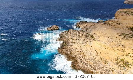 Flight Over Dwerja Bay At The Coast Of Gozo Malta - Aerial Photography