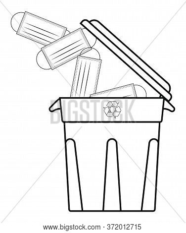 Used Medical Masks Fly Into The Bin, A Container For Recycling. End Of Pandemic, The Victory Over Th
