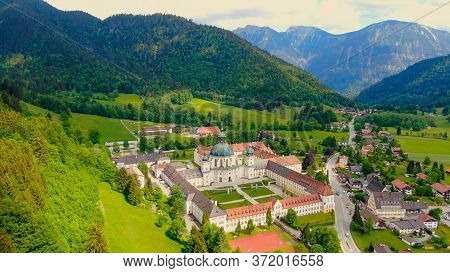 Ettal Abbey, Called Kloster Ettal, A Monastery In The Village Of Ettal, Bavaria, Germany - Aerial Ph