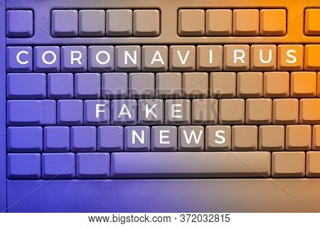 Text Fake News On Keys Of Keyboard, Close-up On Electronic Computer Keyboard With Warning Message To