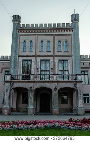 Auce, Latvia- August 2019: Town Pink Color Castle Architecture Building