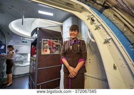 BANGKOK, THAILAND - CIRCA JANUARY, 2020: crew member of Etihad Airways meet passengers. Etihad Airways is the flag carrier of the UAE.