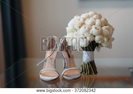 Beautiful Fresh Wedding Bouquet With Brides Shoes