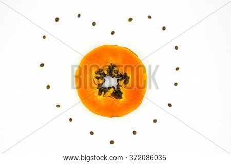 Top View Papaya Cutting Shape Of The Heart On Ehite Background. Smoothies. The Flat Lying Structure.