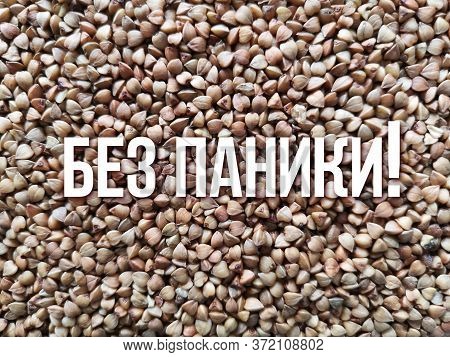 Scattered Buckwheat Background, Top View, Flat Lay. Close-up Buckwheat Background. Text Bez Paniki I