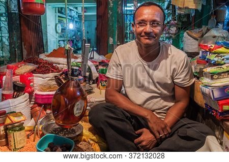 Khulna, Bangladesh - November 12, 2016: Local Seller At A Market In Khulna, Bangladesh