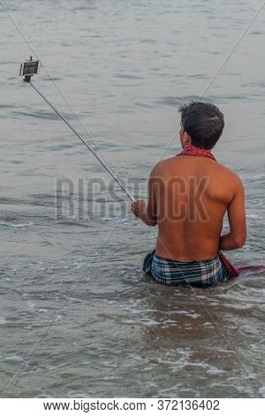 Dublar Char, Bangladesh - November 14, 2016: Hindu Devotee Taking Selfie During His Holy Dip During 