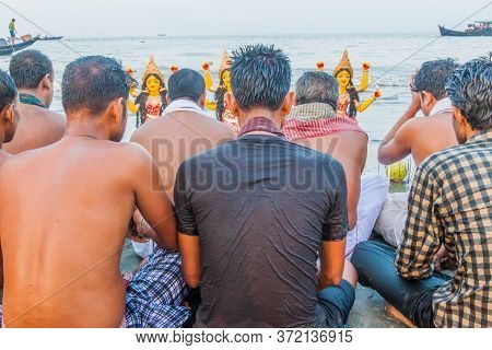 Dublar Char, Bangladesh - November 14, 2016: Hindu Devotees Praying Before Their Holy Dip During Ras