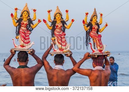 Dublar Char, Bangladesh - November 14, 2016: Hindu Devotees Carrying Goddess Lakshmi Statues During 