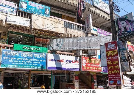 Sonargaon, Bangladesh - November 21, 2016: Houses Covered Under Advertisments In Sonargaon Town, Ban