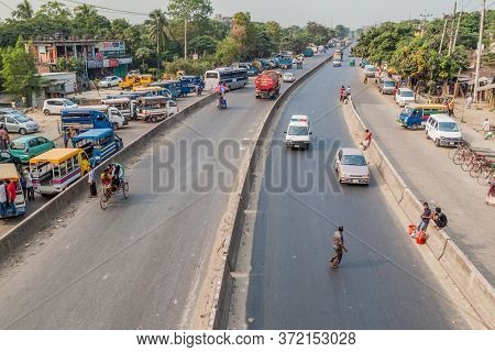 Sonargaon, Bangladesh - November 21, 2016: Traffic On N1 Road In Sonargaon Town, Bangladesh