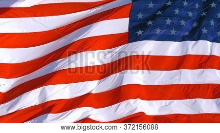 Full Frame: Usa American Flag Background Texture. American Flag Background Waving In The Wind. Close