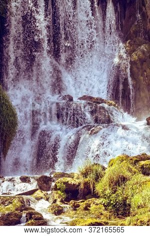 Kravice Waterfall On The Trebizat River In Bosnia And Herzegovina In Autumn. Miracle Of Nature In Bo