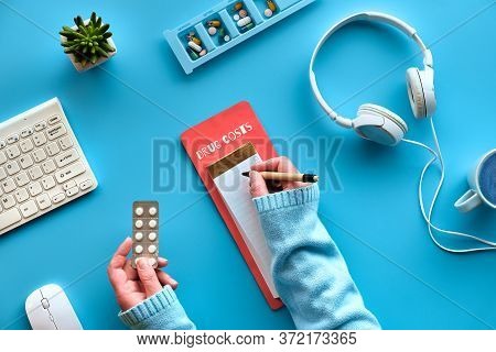Creative Flat Lay With Pen And Calculator In Hands To Calculate Drug Costs. Keyboard, Calculator, Pi