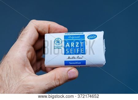 Paris, France - Aug 1, 2019: Male Hand Holding Original Arzt Seife Soap Bar Manufactured By Speick F