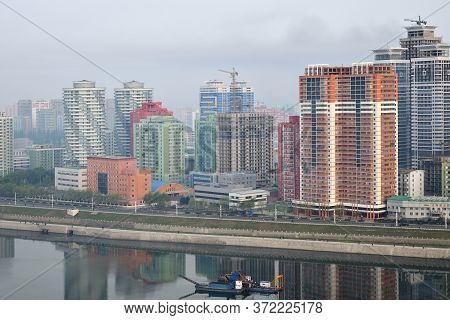 Pyongyang, North Korea -  April 30, 2019: Skyline And Taedong River In The Morning Fog. View On Mode