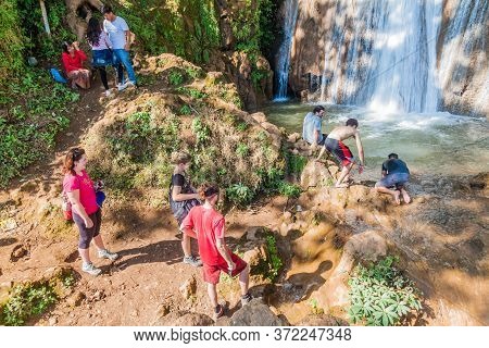 Hsipaw, Myanmar - December 2, 2016: Tourists Enjoy Nam Tuk Waterfall Near Hsipaw, Myanmar