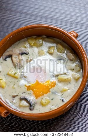 dill soup with poached egg