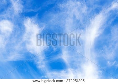 Beautiful Abstract Background. Blue Summer Sky With White Clouds. Natural Colors.
