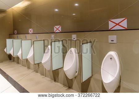 Social Distancing In Toilet / Cross Sign At Chamber Pot For Social Distancing
